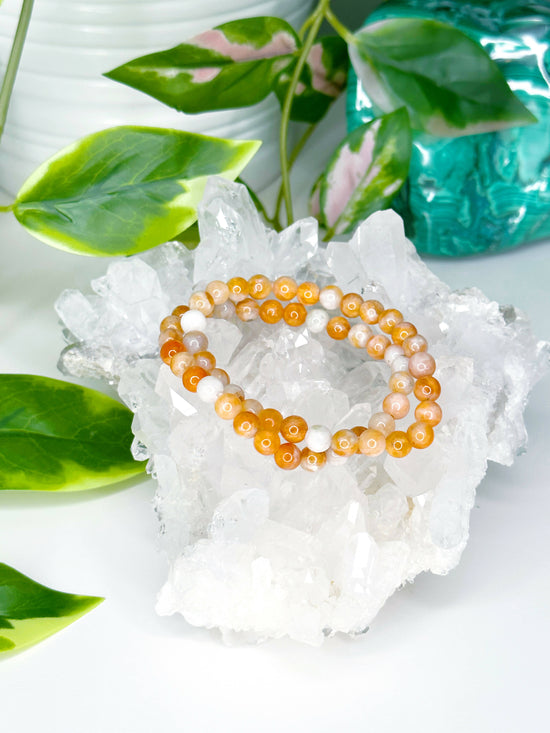 Load image into Gallery viewer, Creamsicle Orange Calcite 6mm Bracelet
